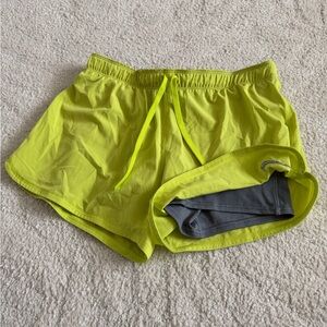 Nike Women's Neon Yellow Athletic Shorts with Gray Inner Liner